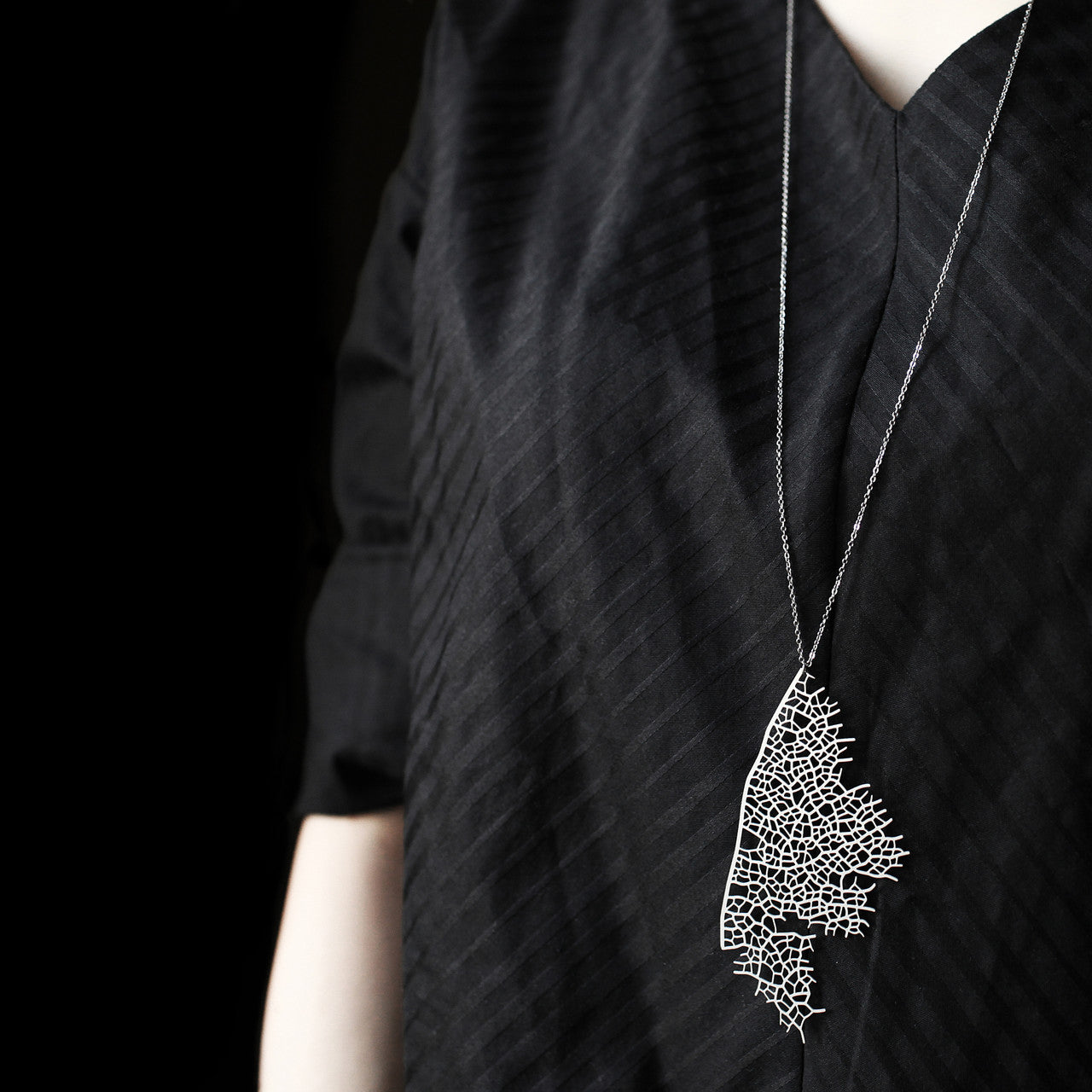 Moorigin stainless steel pendant with skeleton leaf motif