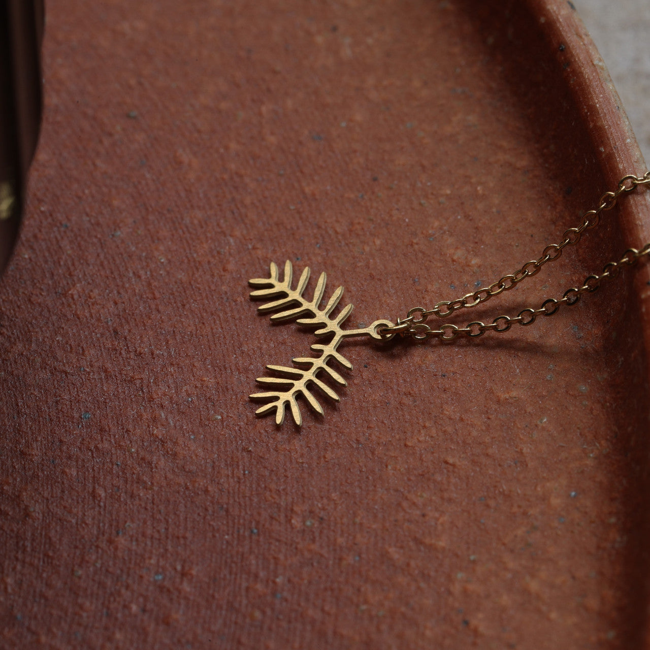 Moorigin_laser_cut_jewellery_necklace_pendant_gold_plated_stainless_steel_mimosa_pudica_leaf