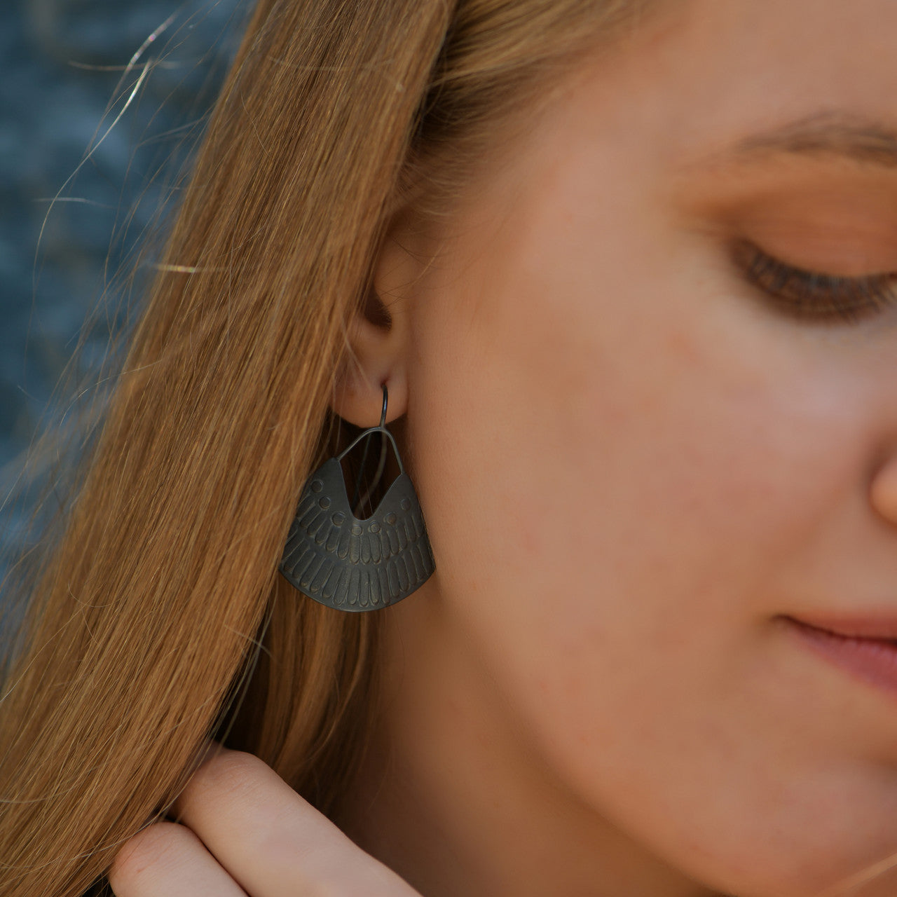 Milly_Thomas_handmade_jewellery_earrings_drop_oxidised_sterling_silver_embossed_warrior_earrings_Australia