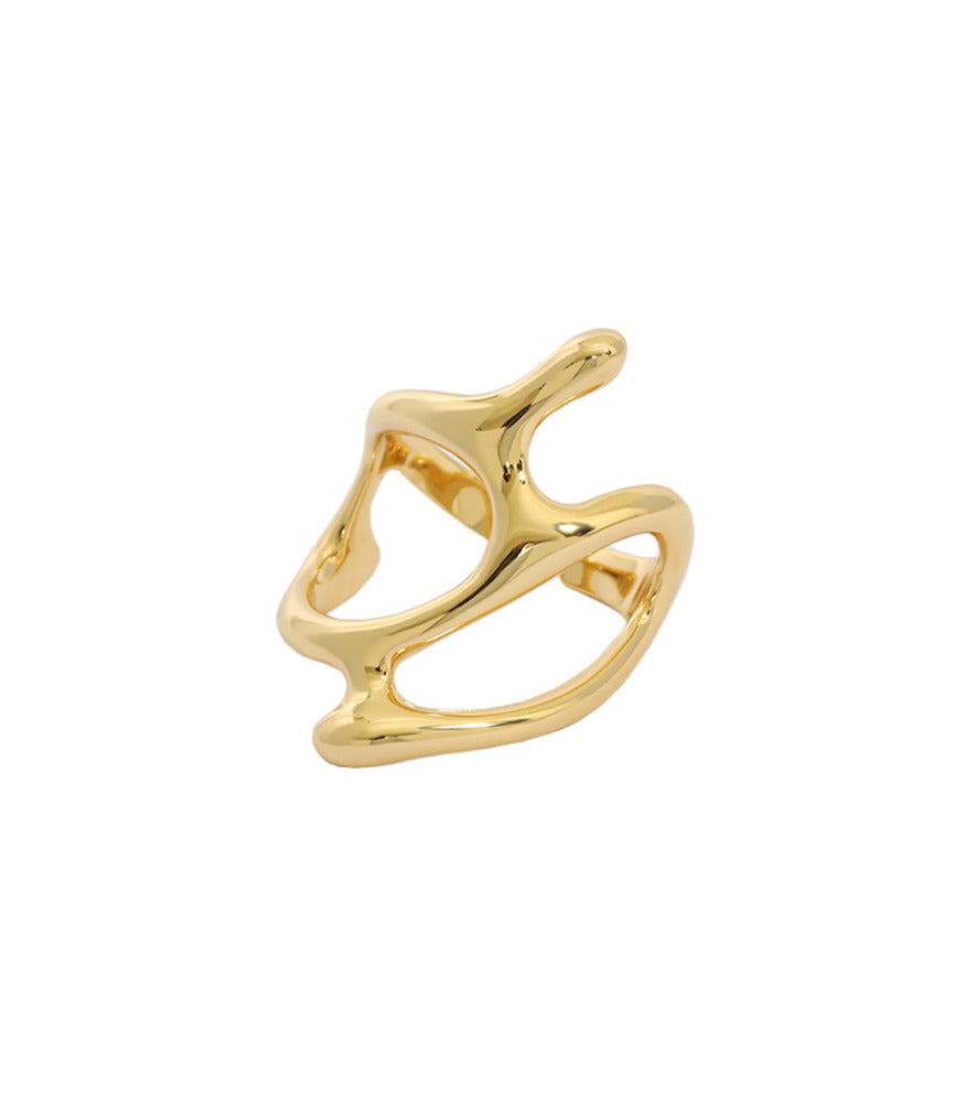 A gold vermeil ring with a smooth texture. The shape of the ring is similar to water droplets slowly moving.